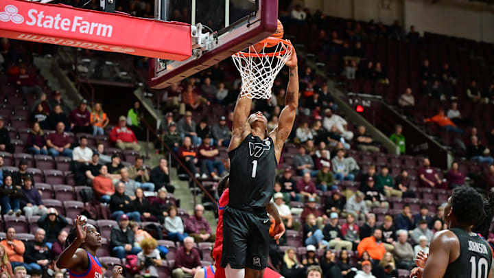 Feb 5, 2025; Blacksburg, Virginia, USA; Virginia Tech Hokies forward Tobi Lawal (1) goes up for a dunk against Southern Methodist Mustangs during the second half at Cassell Coliseum. Mandatory Credit: Brian Bishop-Imagn Images Feb 5, 2025; Blacksburg, Virginia, USA; Virginia Tech Hokies forward Tobi Lawal (1) goes up for a dunk against Southern Methodist Mustangs during the second half at Cassell Coliseum. Mandatory Credit: Brian Bishop-Imagn Images