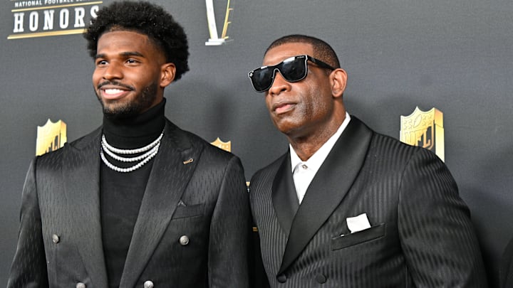 Deion Sanders (right) with his son Shedeur Sanders (left) pose on the red carpet of the 2025 NFL Honors event. Deion Sanders (right) with his son Shedeur Sanders (left) pose on the red carpet of the 2025 NFL Honors event.