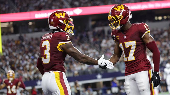 Washington Commanders wide receiver Stefon Diggs (3) celebrates with wide receiver Terry McLaurin (17) after catching a four-yard pass for a touchdown thrown by quarterback Jayden Daniels (not pictured) against the Dallas Cowboys during the first half at AT&T Stadium. Washington Commanders wide receiver Stefon Diggs (3) celebrates with wide receiver Terry McLaurin (17) after catching a four-yard pass for a touchdown thrown by quarterback Jayden Daniels (not pictured) against the Dallas Cowboys during the first half at AT&T Stadium.