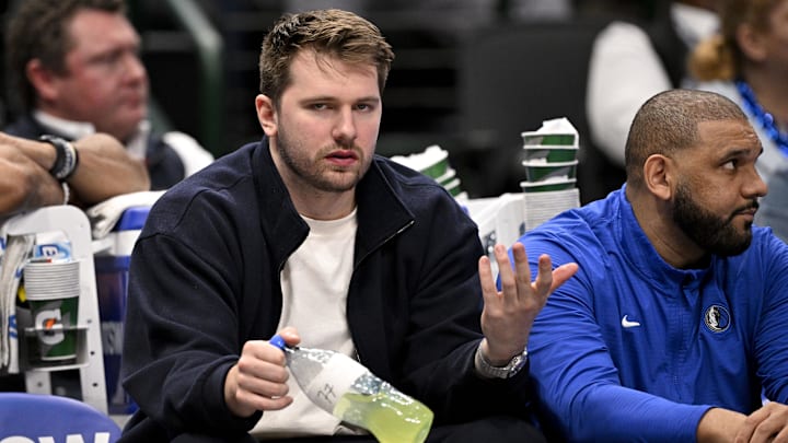 Mavericks guard Luka Doncic reacts from the team bench during the second half of the game against the Nuggets at American Airlines Center. Mavericks guard Luka Doncic reacts from the team bench during the second half of the game against the Nuggets at American Airlines Center.
