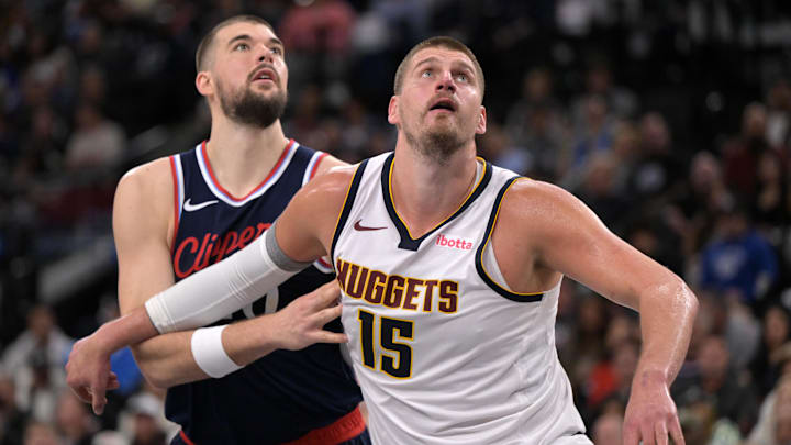 Apr 26, 2025; Inglewood, California, USA; Denver Nuggets center Nikola Jokic (15) and Los Angeles Clippers center Ivica Zubac (40) looks for a rebound in the second half of game four of round one of the 2024 NBA Playoffs at Intuit Dome. Mandatory Credit: Jayne Kamin-Oncea-Imagn Images
