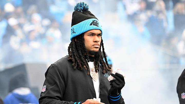Carolina Panthers running back Jonathon Brooks (24) walk on to the field Carolina Panthers running back Jonathon Brooks (24) walk on to the field