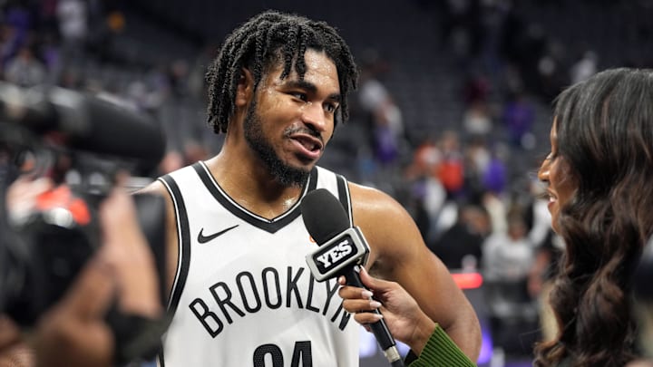 Nov 24, 2024; Sacramento, California, USA; Brooklyn Nets guard Cam Thomas (24) is interviewed after defeating the Sacramento Kings at Golden 1 Center. Mandatory Credit: Darren Yamashita-Imagn Images