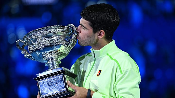 Carlos Alcaraz defeated Novak Djokovic to win the 2026 Australian Open title. Carlos Alcaraz defeated Novak Djokovic to win the 2026 Australian Open title.