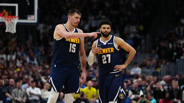 Apr 10, 2024; Denver, Colorado, USA; Denver Nuggets center Nikola Jokic (15) and guard Jamal Murray Apr 10, 2024; Denver, Colorado, USA; Denver Nuggets center Nikola Jokic (15) and guard Jamal Murray