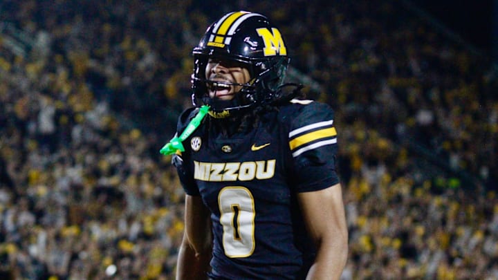 Nov 15, 2025; Columbia, Missouri, USA; Missouri Tigers wide receiver Josh Manning celebrates a touchdown in the Missouri matchup against Mississippi State at Faurot Field. Nov 15, 2025; Columbia, Missouri, USA; Missouri Tigers wide receiver Josh Manning celebrates a touchdown in the Missouri matchup against Mississippi State at Faurot Field.