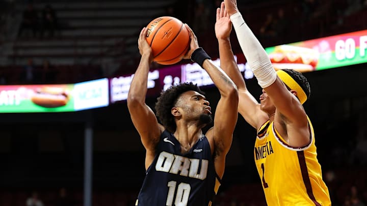Nov 6, 2024; Minneapolis, Minnesota, USA; Oral Roberts Golden Eagles guard Issac McBride (10) drives towards the basket as Minnesota Golden Gophers guard Isaac Asuma (1) defends during the second half at Williams Arena. Mandatory Credit: Matt Krohn-Imagn Images Nov 6, 2024; Minneapolis, Minnesota, USA; Oral Roberts Golden Eagles guard Issac McBride (10) drives towards the basket as Minnesota Golden Gophers guard Isaac Asuma (1) defends during the second half at Williams Arena. Mandatory Credit: Matt Krohn-Imagn Images