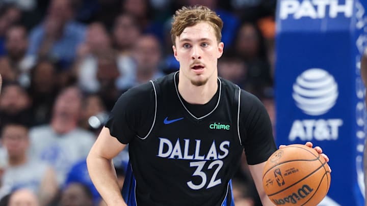 Nov 16, 2025; Dallas, Texas, USA;  Dallas Mavericks forward Cooper Flagg (32) dribbles against the Portland Trail Blazers during the second quarter at American Airlines Center. Mandatory Credit: Kevin Jairaj-Imagn Images