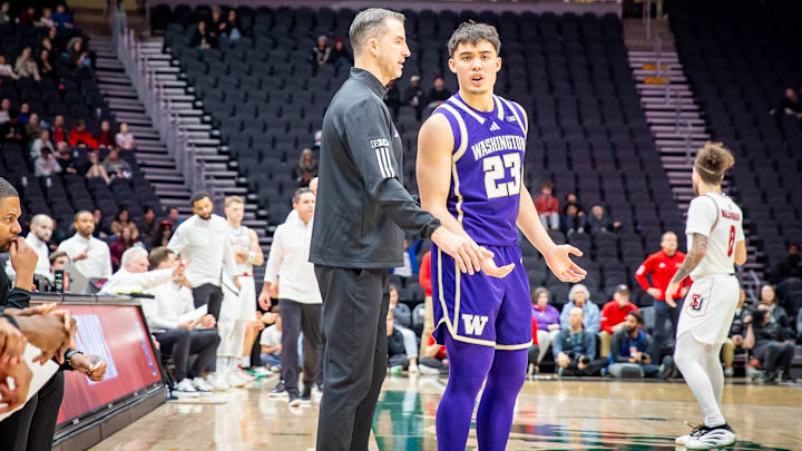 Danny Sprinkle and JJ Mandaquit confer during the Seattle U game. 