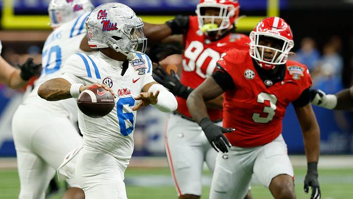 Mississippi Rebels quarterback Trinidad Chambliss (6) passes the ball under pressure from Georgia Bulldogs linebacker CJ Allen (3) during the first half of the 2026 Sugar Bowl.
