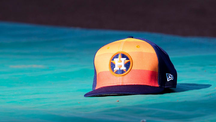 Apr 9, 2024; Kansas City, Missouri, USA; A general view of Houston Astros second base Jose Altuve (27) hat on the field during batting practice prior to a game against the Kansas City Royals at Kauffman Stadium.