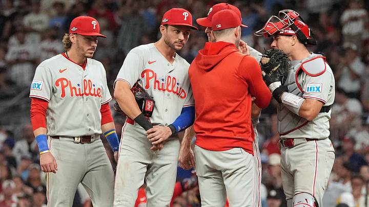 Oct 1, 2026; Cumberland, Georgia, USA; Philadelphia Phillies infielder Trea Turner (7) listens to pitching coach Caleb Cotham (65) with infielders Bryson Stott (5) and Edmundo Sosa (33) during a mound visit against the Atlanta Braves in the sixth inning in game three of the Wildcard round for the 2026 MLB Playoffs at Truist Field. Mandatory Credit: Dale Zanine-Imagn Images Oct 1, 2026; Cumberland, Georgia, USA; Philadelphia Phillies infielder Trea Turner (7) listens to pitching coach Caleb Cotham (65) with infielders Bryson Stott (5) and Edmundo Sosa (33) during a mound visit against the Atlanta Braves in the sixth inning in game three of the Wildcard round for the 2026 MLB Playoffs at Truist Field. Mandatory Credit: Dale Zanine-Imagn Images