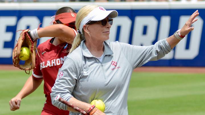 Oklahoma coach Patty Gasso waves to a fan while the Sooners warm up at the 2025 WCWS. Oklahoma coach Patty Gasso waves to a fan while the Sooners warm up at the 2025 WCWS.