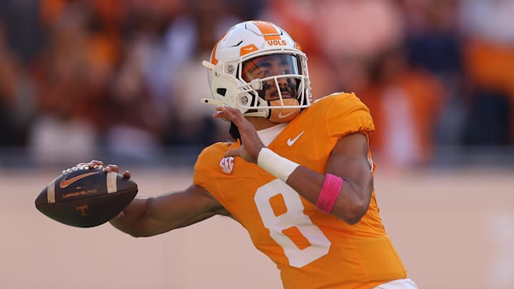 Oct 19, 2024; Knoxville, Tennessee, USA; Tennessee Volunteers quarterback Nico Iamaleava (8) passes the ball against the Alabama Crimson Tide during the first quarter at Neyland Stadium. Mandatory Credit: Randy Sartin-Imagn Images
