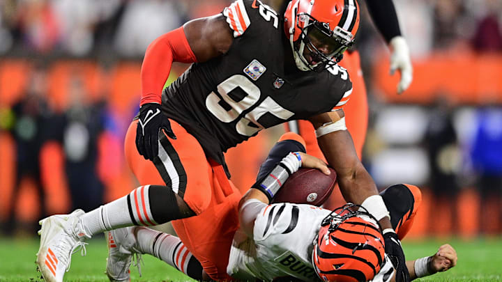 Oct 31, 2022; Cleveland, Ohio, USA; Cleveland Browns defensive end Myles Garrett (95) sacks Cincinnati Bengals quarterback Joe Burrow (9) in the fourth quarter at FirstEnergy Stadium. Mandatory Credit: David Dermer-Imagn Images