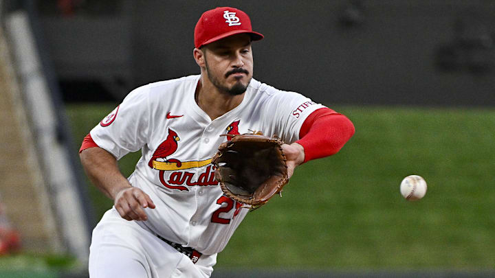Sep 16, 2024; St. Louis, Missouri, USA;  St. Louis Cardinals third baseman Nolan Arenado (28) fields a ground ball against the Pittsburgh Pirates during the first inning at Busch Stadium