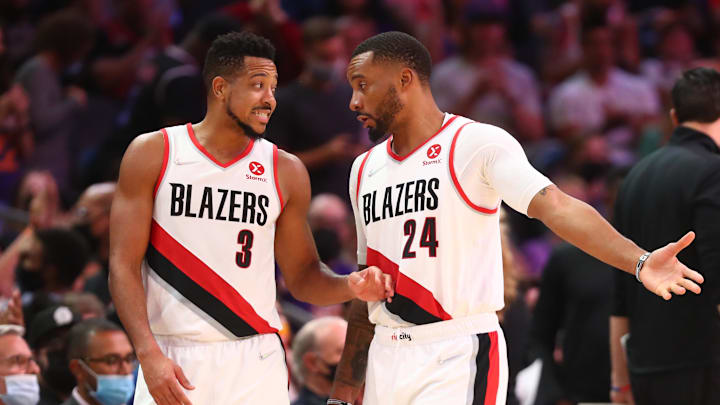 Nov 10, 2021; Phoenix, Arizona, USA; Portland Trail Blazers guard CJ McCollum (3) and forward Norman Powell (24) against the Phoenix Suns at Footprint Center. Mandatory Credit: Mark J. Rebilas-Imagn Images
