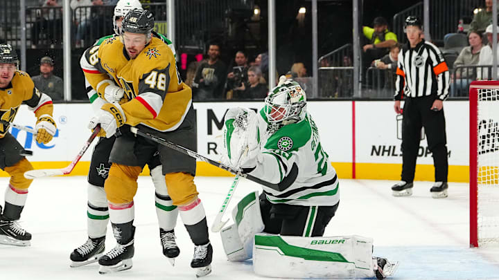 Dec 6, 2024; Las Vegas, Nevada, USA; Vegas Golden Knights center Tomas Hertl (48) looks to deflect an incoming shot in front of Dallas Stars goaltender Jake Oettinger (29) during the second period at T-Mobile Arena. Mandatory Credit: Stephen R. Sylvanie-Imagn Images