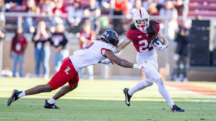 Nov 16, 2024; Stanford, California, USA; Stanford Cardinal wide receiver Tiger Bachmeier (24) turns the corner during the second quarter against the Louisville Cardinals at Stanford Stadium. Mandatory Credit: Bob Kupbens-Imagn Images Nov 16, 2024; Stanford, California, USA; Stanford Cardinal wide receiver Tiger Bachmeier (24) turns the corner during the second quarter against the Louisville Cardinals at Stanford Stadium. Mandatory Credit: Bob Kupbens-Imagn Images
