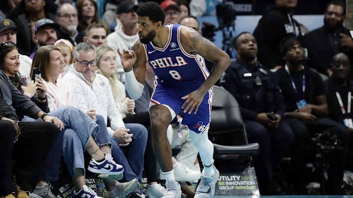 Mar 28, 2026; Charlotte, North Carolina, USA; Philadelphia 76ers forward Paul George (8) celebrates after making a basket during the fourth quarter against the Charlotte Hornets at Spectrum Center. Mandatory Credit: Brian Westerholt-Imagn Images