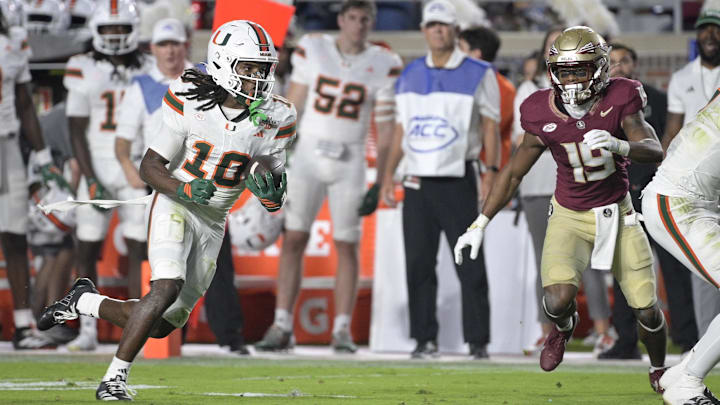 Oct 4, 2025; Tallahassee, Florida, USA; Miami Hurricanes wide receiver Malachi Toney (10) runs against Florida State Seminoles defensive back Jerry Wilson (19) during the first half at Doak S. Campbell Stadium. Mandatory Credit: Melina Myers-Imagn Images Oct 4, 2025; Tallahassee, Florida, USA; Miami Hurricanes wide receiver Malachi Toney (10) runs against Florida State Seminoles defensive back Jerry Wilson (19) during the first half at Doak S. Campbell Stadium. Mandatory Credit: Melina Myers-Imagn Images