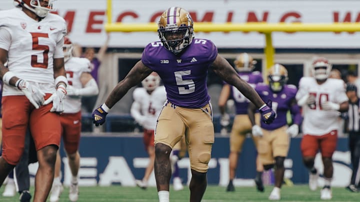 Giles Jackson jumps up after a late Apple Cup catch. 