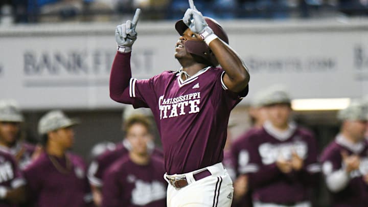 Mississippi State outfielder Dakota Jordan (42) hits a two run home run against Ole Miss in the 6th