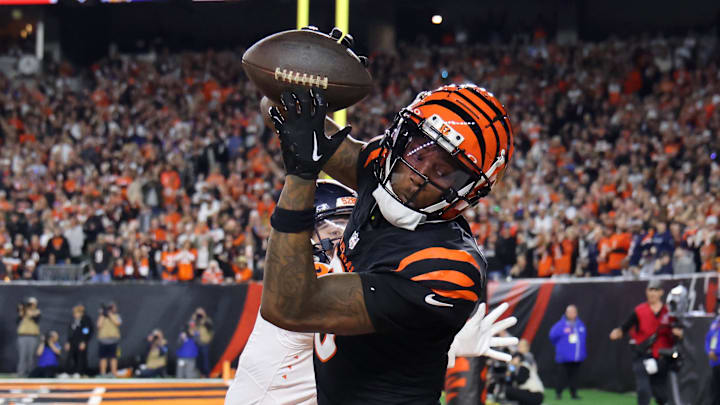 Dec 28, 2024; Cincinnati, Ohio, USA;  Cincinnati Bengals  wide receiver Tee Higgins (5) catches a touchdown.