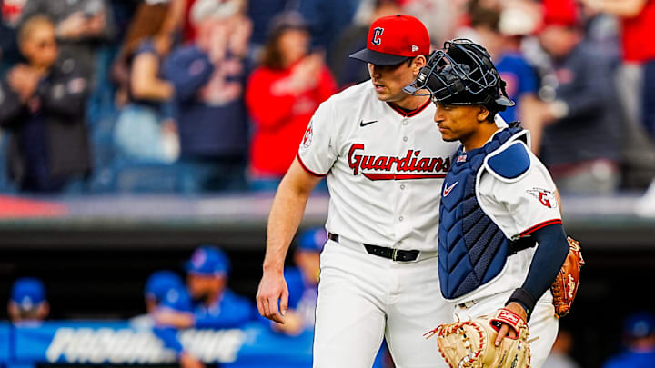 Cleveland Guardians pitcher Cade Smith (36) and Cleveland Guardians catcher Bo Naylor (23) celebrate their win over the Chicago Cubs during the home opening game against the Chicago Cubs, April 4, 2026, at Progressive Field in Cleveland, Ohio.