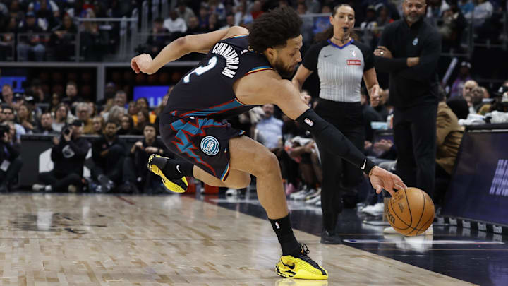Jan 17, 2026; Detroit, Michigan, USA;  Detroit Pistons guard Cade Cunningham (2) saves the ball in the first half against the Indiana Pacers at Little Caesars Arena. Mandatory Credit: Rick Osentoski-Imagn Images