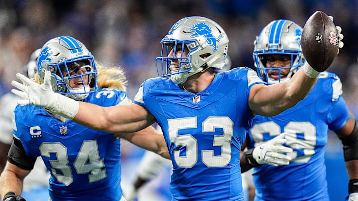 Detroit Lions linebacker Trevor Nowaske (53), center, celebrates an interception against Tennessee Titans during the first half at Ford Field in Detroit on Sunday, Oct. 27, 2024.