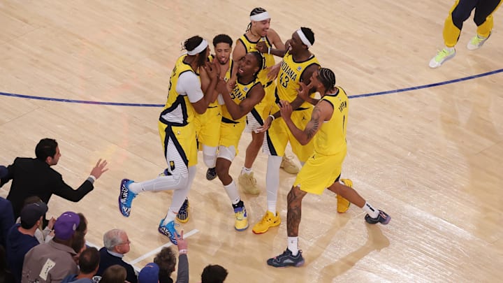 May 21, 2025; New York, New York, USA; Indiana Pacers guard Tyrese Haliburton (0) celebrates with teammates after tying the game in the fourth quarter to send the game to overtime against the New York Knicks during game one of the eastern conference finals for the 2025 NBA Playoffs at Madison Square Garden. Mandatory Credit: Brad Penner-Imagn Images