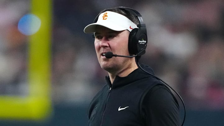 Dec 27, 2024; Las Vegas, NV, USA; Southern California Trojans head coach Lincoln Riley reacts against the Texas A&M Aggies in the first half at Allegiant Stadium. Mandatory Credit: Kirby Lee-Imagn Images