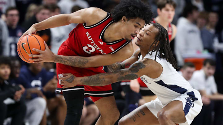 Penn State guard Ace Baldwin Jr. defends again Rutgers Scarlet Knights guard Dylan Harper in a Big Ten men's basketball game at the Bryce Jordan Center. 