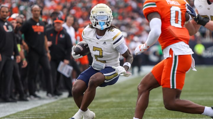 Nov 9, 2024; Atlanta, Georgia, USA; Georgia Tech Yellow Jackets wide receiver Eric Singleton Jr. (2) runs the ball against the Miami Hurricanes in the second quarter at Bobby Dodd Stadium at Hyundai Field. Mandatory Credit: Brett Davis-Imagn Images