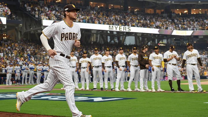 Oct 14, 2022; San Diego, California, USA; San Diego Padres right fielder Wil Myers (5) is introduced before the game against the Los Angeles Dodgers during game three of the NLDS for the 2022 MLB Playoffs at Petco Park. Mandatory Credit: Orlando Ramirez-Imagn Images