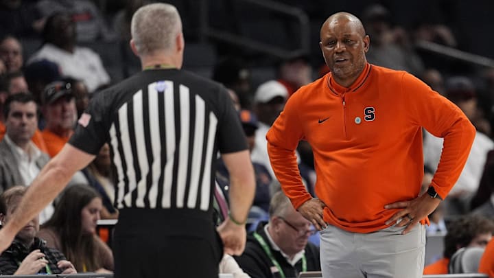 Mar 12, 2025; Charlotte, NC, USA; Syracuse Orange head coach Adrian Autrey reacts to a call by the official  during the second half against the Southern Methodist Mustangs at Spectrum Center. Mandatory Credit: Jim Dedmon-Imagn Images