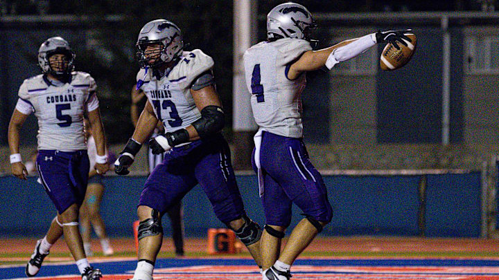 Franklin’s Ernie Powers (4) celebrates a touchdown. Franklin’s Ernie Powers (4) celebrates a touchdown.