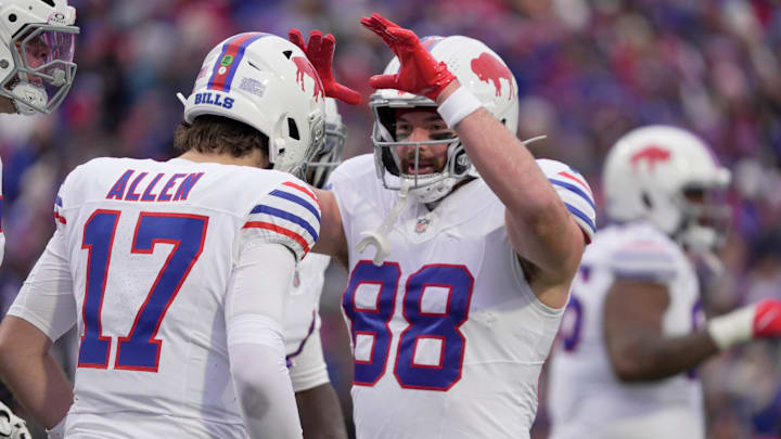 Buffalo Bills tight end Dawson Knox high fives Buffalo Bills quarterback Josh Allen who just scored on a two-yard touchdown run during first half action against the Tampa Bay Buccaneers on Nov 16, 2025 at Highmark Stadium in Orchard Park. Buffalo Bills tight end Dawson Knox high fives Buffalo Bills quarterback Josh Allen who just scored on a two-yard touchdown run during first half action against the Tampa Bay Buccaneers on Nov 16, 2025 at Highmark Stadium in Orchard Park.