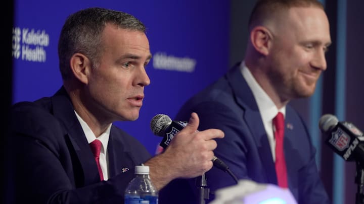 Brandon Beane, president of football operations and general manager for the Buffalo BIlls, and head coach Joe Brady take turns answering questions during a press conference that introduced Brady as the new head coach at the Bills field house in Orchard Park on Jan. 29, 2026.