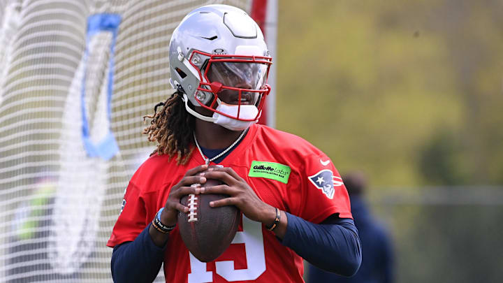 May 11, 2024; Foxborough, MA, USA; New England Patriots quarterback Joe Milton III (19) throws a pass at the New England Patriots rookie camp at Gillette Stadium.  Mandatory Credit: Eric Canha-USA TODAY Sports