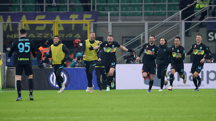 Milan Skriniar and his teammates race to celebrate Inter's winning goal with the assist provider, Alessandro Bastoni (left) Milan Skriniar and his teammates race to celebrate Inter's winning goal with the assist provider, Alessandro Bastoni (left)