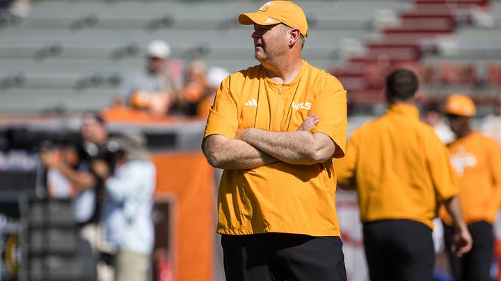 Oct 10, 2026; Fayetteville, Arkansas, USA; Tennessee Volunteers head coach Josh Heupel watches his team warmup before the game against the Arkansas Razorbacks at Donald W. Reynolds Razorback Stadium. Mandatory Credit: Brett Rojo-Imagn Images Oct 10, 2026; Fayetteville, Arkansas, USA; Tennessee Volunteers head coach Josh Heupel watches his team warmup before the game against the Arkansas Razorbacks at Donald W. Reynolds Razorback Stadium. Mandatory Credit: Brett Rojo-Imagn Images