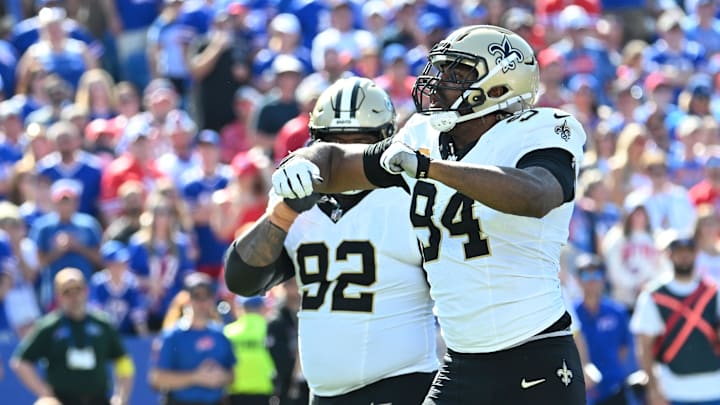 Sep 28, 2025; Orchard Park, New York, USA; New Orleans Saints defensive end Cameron Jordan (94) reacts after sacking Buffalo Bills quarterback Josh Allen (17) during the second quarter at Highmark Stadium. Mandatory Credit: Mark Konezny-Imagn Images