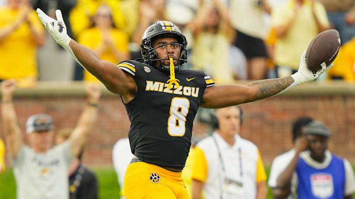 Oct 11, 2025; Columbia, Missouri, USA; Missouri Tigers defensive end Damon Wilson II (8) celebrates after recovering a fumble during the second half against the Alabama Crimson Tide at Faurot Field at Memorial Stadium. Mandatory Credit: Jay Biggerstaff-Imagn Images Oct 11, 2025; Columbia, Missouri, USA; Missouri Tigers defensive end Damon Wilson II (8) celebrates after recovering a fumble during the second half against the Alabama Crimson Tide at Faurot Field at Memorial Stadium. Mandatory Credit: Jay Biggerstaff-Imagn Images