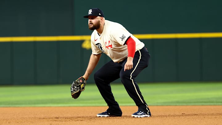 Jul 18, 2025; Arlington, Texas, USA; Texas Rangers first baseman Rowdy Tellez (44) fields during the first inning against the Detroit Tigers at Globe Life Field. Jul 18, 2025; Arlington, Texas, USA; Texas Rangers first baseman Rowdy Tellez (44) fields during the first inning against the Detroit Tigers at Globe Life Field.