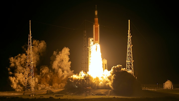 The unmanned Artemis I launching in 2022.