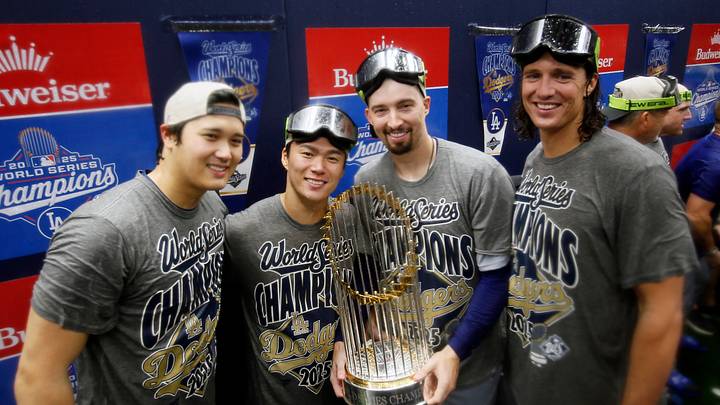 Oct 31, 2025; Toronto, Ontario, CAN; Los Angeles Dodgers two-way player Shohei Ohtani (17) and pitcher Yoshinobu Yamamoto (18) and pitcher Blake Snell (7) and pitcher Tyler Glasnow (31) celebrate with the Commissioner's Trophy in the clubhouse after defeating the Toronto Blue Jays in the 2025 MLB World Series at Rogers Centre. Mandatory Credit: John E. Sokolowski-Imagn Images Oct 31, 2025; Toronto, Ontario, CAN; Los Angeles Dodgers two-way player Shohei Ohtani (17) and pitcher Yoshinobu Yamamoto (18) and pitcher Blake Snell (7) and pitcher Tyler Glasnow (31) celebrate with the Commissioner's Trophy in the clubhouse after defeating the Toronto Blue Jays in the 2025 MLB World Series at Rogers Centre. Mandatory Credit: John E. Sokolowski-Imagn Images