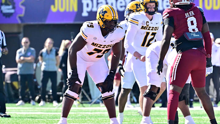 Oct 12, 2024; Amherst, Massachusetts, USA; Missouri Tigers offensive lineman Armand Membou (79) lines up against the Massachusetts Minutemen during the first half at Warren McGuirk Alumni Stadium. Mandatory Credit: Eric Canha-Imagn Images Oct 12, 2024; Amherst, Massachusetts, USA; Missouri Tigers offensive lineman Armand Membou (79) lines up against the Massachusetts Minutemen during the first half at Warren McGuirk Alumni Stadium. Mandatory Credit: Eric Canha-Imagn Images