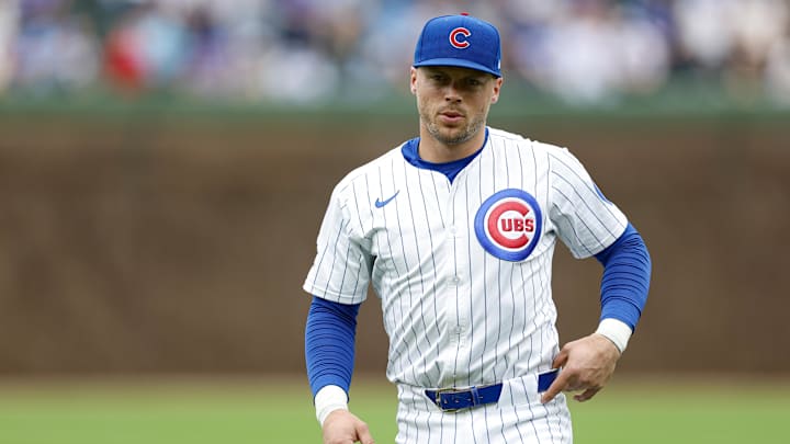 Apr 18, 2025; Chicago, Illinois, USA; Chicago Cubs second baseman Nico Hoerner (2) warms up before a baseball game against the Arizona Diamondbacks at Wrigley Field. Mandatory Credit: Kamil Krzaczynski-Imagn Images